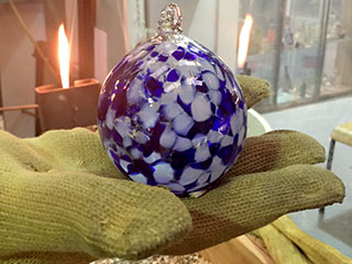 A Completed Handmade Glass Christmas Bauble By Bath Aqua Glass